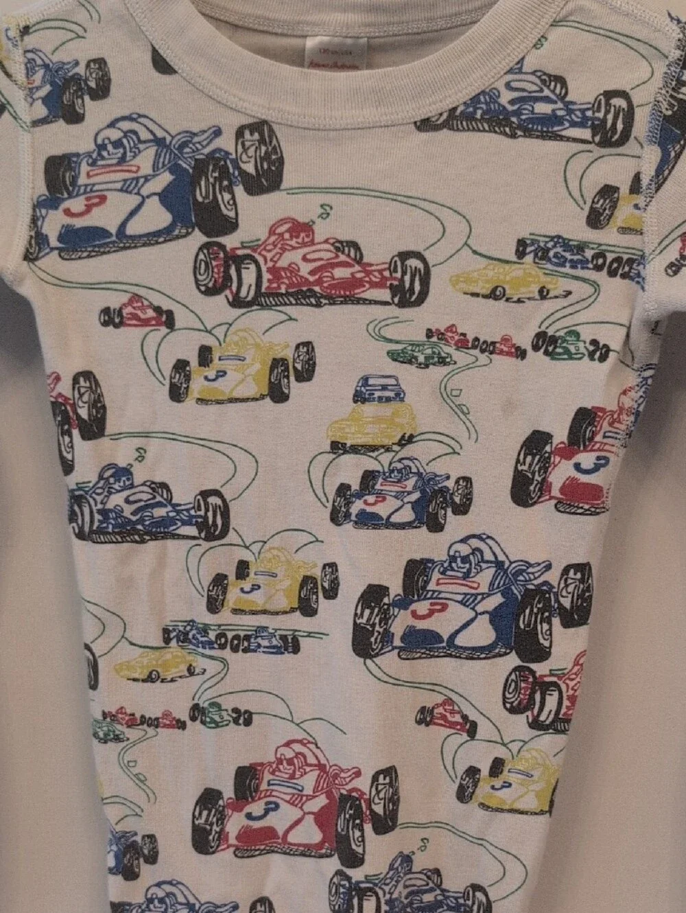 Hanna Andersson White Kids Pajama Set with Red Blue Yellow Racecar Print